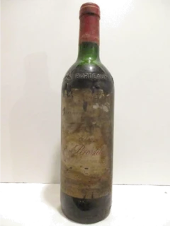 photo 1986 Côtes de Francs Château Peroutet Étiquette et Capsule Abîmées) Rouge Bordeaux